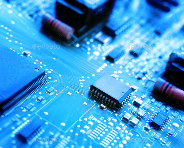 Microchips on a circuit board - Stock Photo - Images