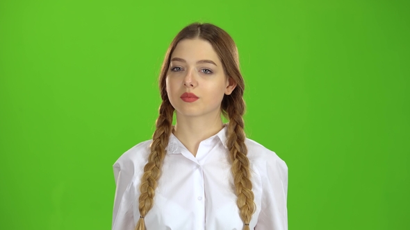 Student in a White Blouse and Pigtails, Stock Footage | VideoHive