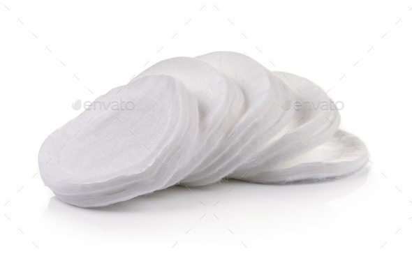 Cotton round cosmetic pads isolated on white background
