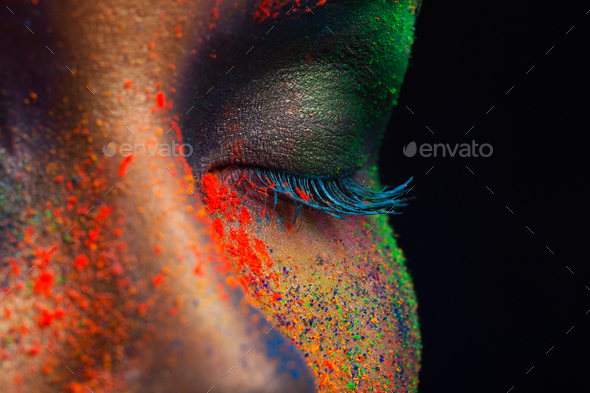 Eye of model with colorful art make-up, close-up - Stock Photo - Images