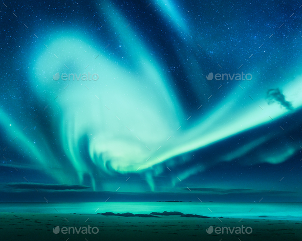Polar lights above the sea. Green northern lights - Stock Photo - Images