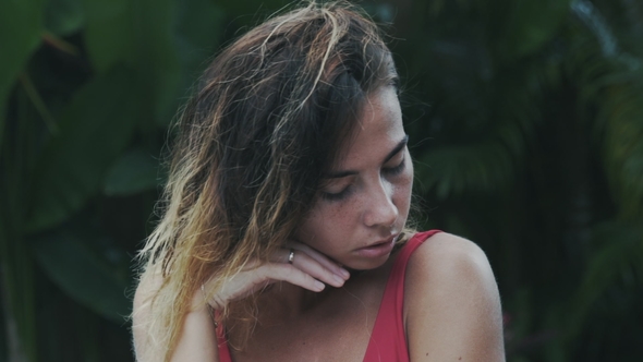 Girl Rests in Her Villa