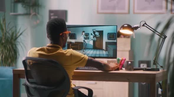 Black 3D Designer Creating Tutorial on Computer alt