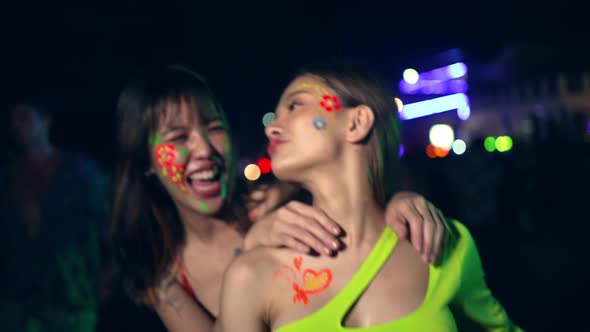 4K Group of Asian woman enjoy full moon beach party and dancing together. alt