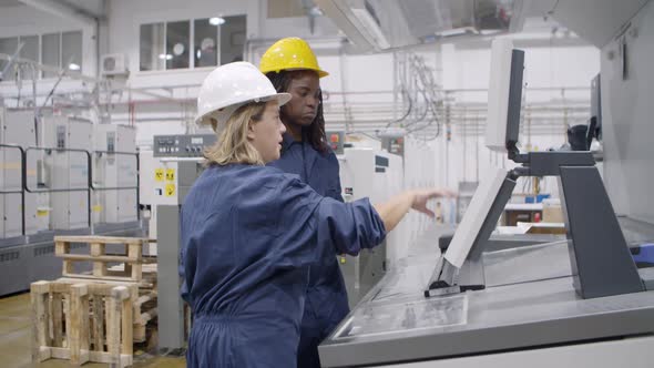 Middle Aged Female Factory Employee Taking Proficiency Exam alt