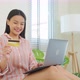 Asian young woman use laptop computer for shopping product sell online. - VideoHive Item for Sale