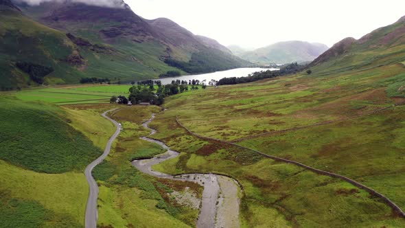 The Honister Pass looking towards Buttermere Lake from a drone. alt