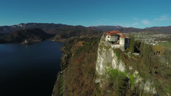 Aerial view of Bled castle on a lake shore