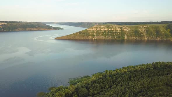 Aerial View of Wide Dnister River and Distant Rocky Hills in Bakota Area Part of the National Park alt