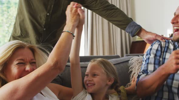 Happy family spending time together at home alt