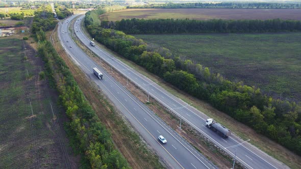 Asphalt straight road with Traffic cars driving alt