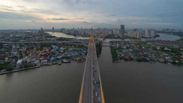 Time lapse of aerial view of Bhumibol Bridge and Chao Phraya River in structure alt