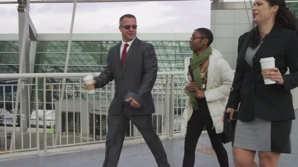 Business people walking at airport
