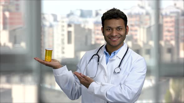 Happy Hindu Doctor Advertising Can of Pills alt