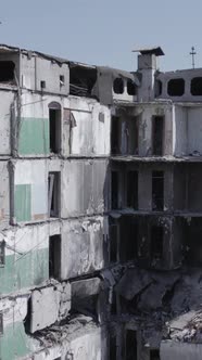 Vertical Video of a Destroyed Residential Building in Ukraine During the War alt