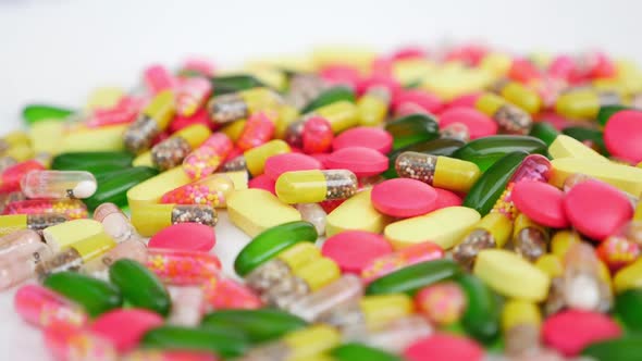 Shot of different color medicines with white background alt
