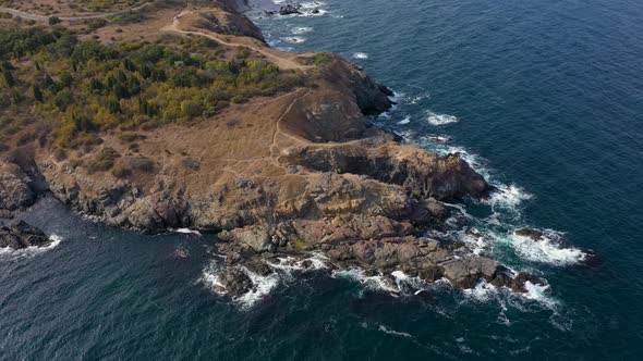 Aerial view to a cape in the sea