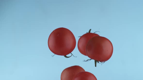 Tomatoes flying in slow motion, shot with Phantom Flex 4K at 1000 frames per second alt