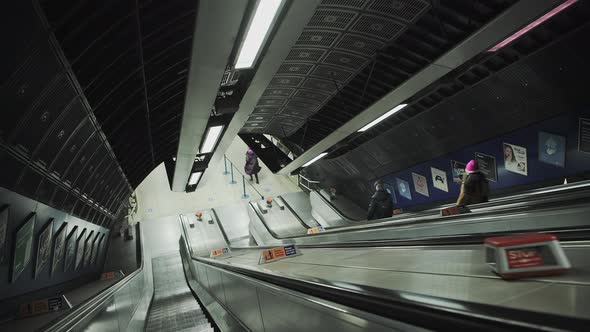 Quiet escalator in London Underground tube train station in Covid-19 Coronavirus pandemic lockdown i alt