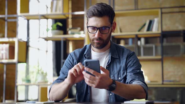 Smart Caucasian Business Man Using Mobile Phone for Chatting Typing Message alt
