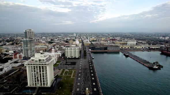 drone shot of the main boardwalk of the port of veracruz at dawn alt