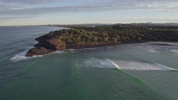 Aerial Of Fingal Headland With Breaking Waves In New South Wales, Australia - drone shot alt