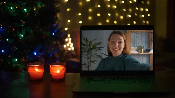 Smiling Woman on a Videocall She Is Happy and Wishing a Merry Christmas Online