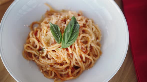 Woman Eating Pasta With Sauce Bolognese alt