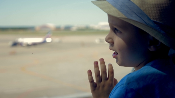 Little Boy Near the Window, . A Boy Looks Through the Big Window at ...