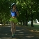Smiling Beautiful Sporty Woman Jogging in Park - VideoHive Item for Sale