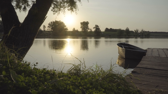 Wooden Boat at Sunset