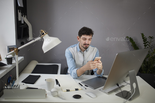 Young manager has received good, bad news Stock Photo by arthurhidden