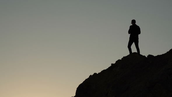 A Man Throws a Stack of Papers alt