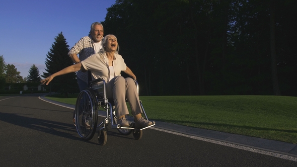 Delighted Disabled Woman Enjoying with Husband alt