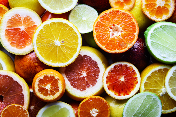 Mix of different citrus fruits closeup Stock Photo by ivankmit | PhotoDune