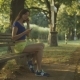 Jogging Woman Setting Music on Mp3 Player Before Run - VideoHive Item for Sale
