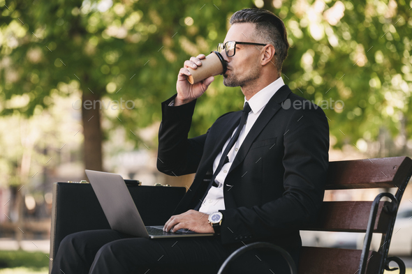 Portrait of a businessman dressed in formal clothes Stock Photo by vadymvdrobot