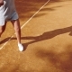 Legs of Tennis Player on Orange Clay Tennis Court During the Game - VideoHive Item for Sale