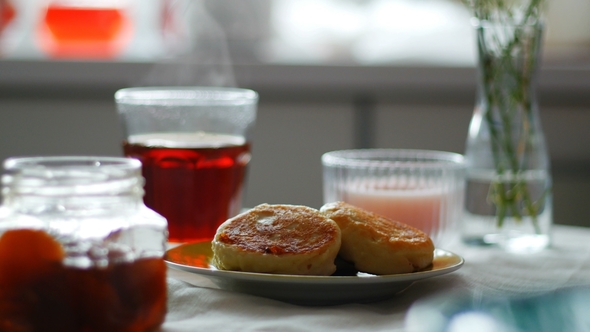 Cheesecake and Tea on Table. Seamless Cinemagraph Video