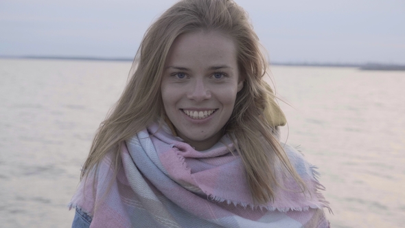Face Portrait of Attractive Happy Woman Standing at Background Sunset Above Sea alt