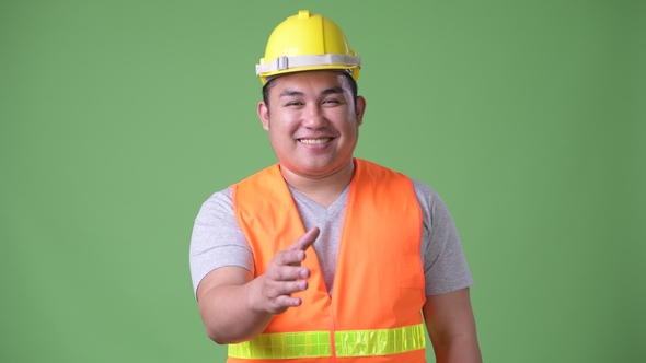 Young Handsome Overweight Asian Man Construction Worker, Stock Footage