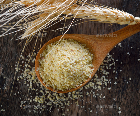 Wheat germ in wood spoon Stock Photo by sommai | PhotoDune