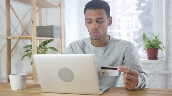 Online Shopping By Afro-American Man, Payment By Credit Card, Stock Footage