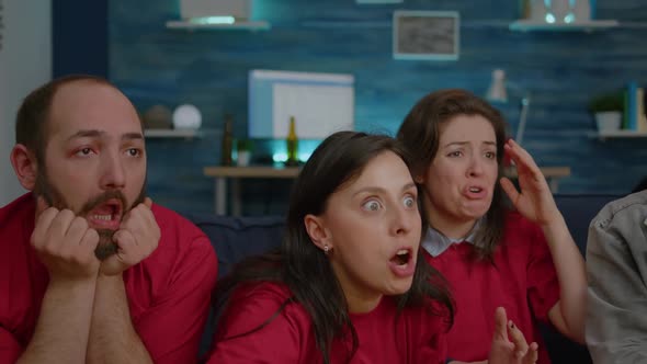 Frustrated Multi Ethnic Friends Disappointed After Football Team Losing Championship alt