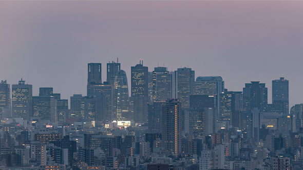 Tokyo, Japan, Timelapse  - The skyline of Shinjuku in Tokyo filmed from the Bunkyo Civic Center alt