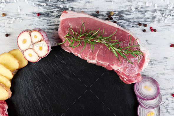 Raw pork meat with spice ingredient - Stock Photo - Images