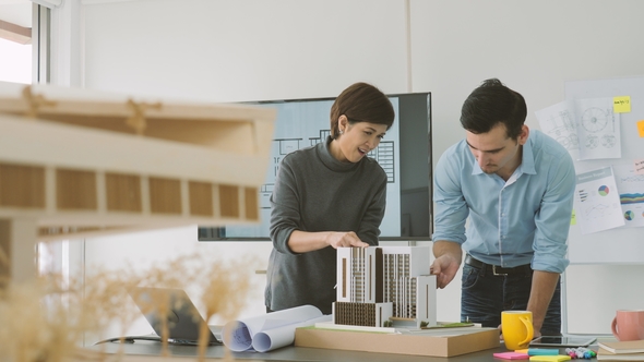 Team of Creative Architects Working Together in a Architect Studio