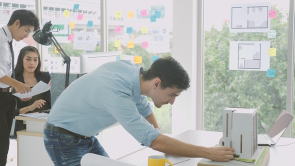 Team of Creative Architects Working Together in a Architect Studio