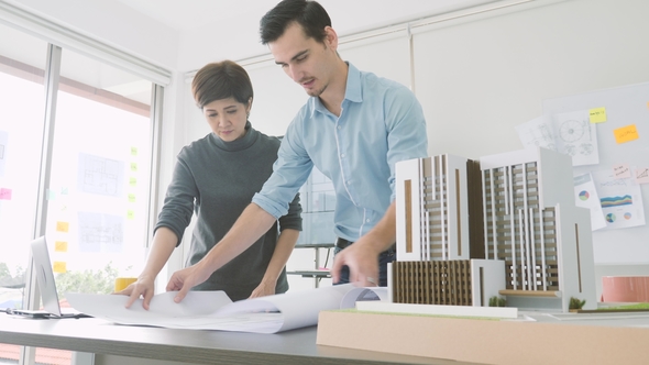 Team of Creative Architects Working Together in a Architect Studio