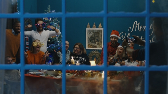 Big Family Taking Photo Together at Christmas alt